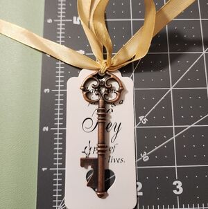 Vintage Key Bottle Opener with Gold Ribbon